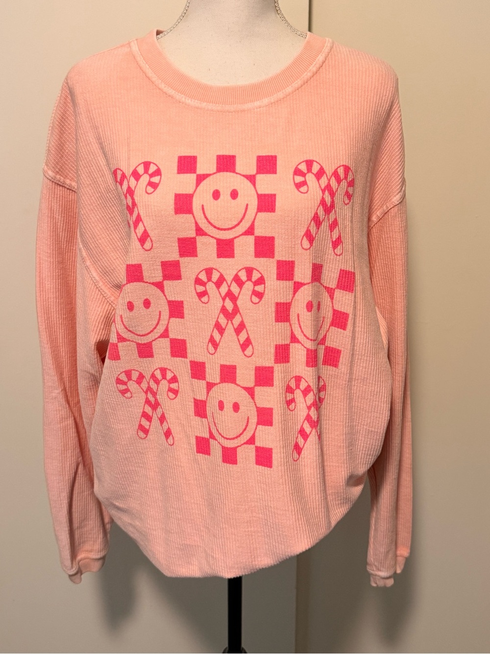 Pink smiley face and candy cane Christmas long sleeve size M